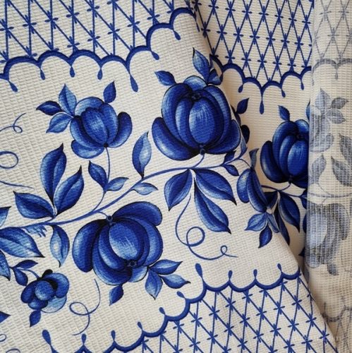Waffle fabric with blue flowers, 50 cm wide.