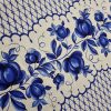 Waffle fabric with blue flowers, 50 cm wide.