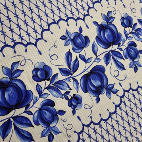 Waffle fabric with blue flowers, 50 cm wide.