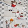 Waffle fabric with cheerful chefs, 50 cm wide.